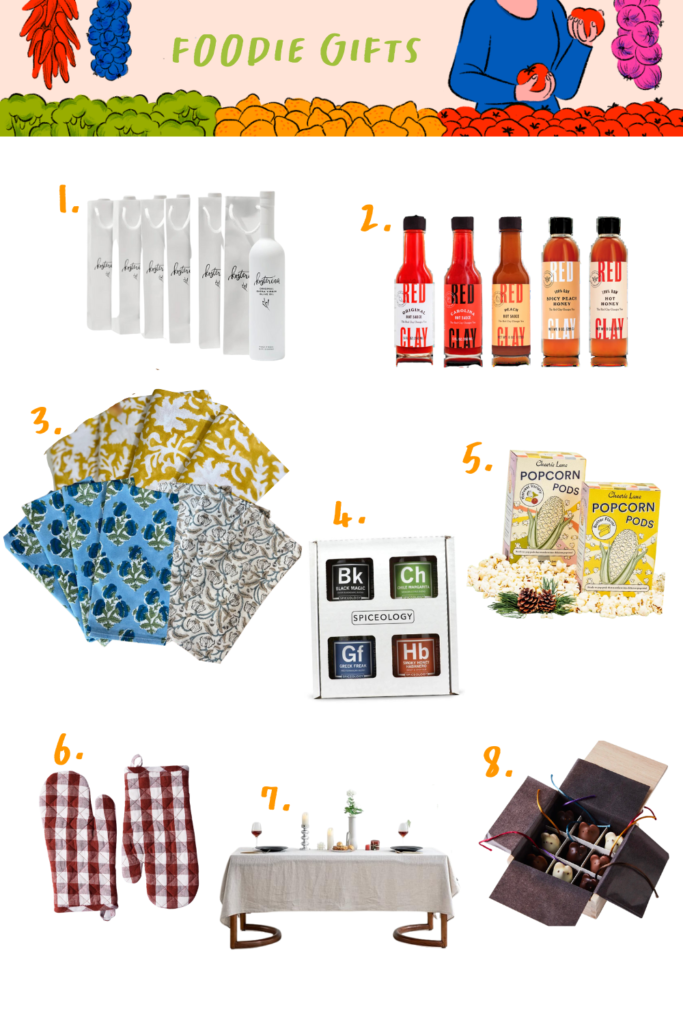A collage of eight foodie gift ideas from our holiday gift guide, including bottled drinks, hot sauces, dish towels, a spice block set, popcorn pods, oven mitts, a tablecloth, and a gift box with various items.