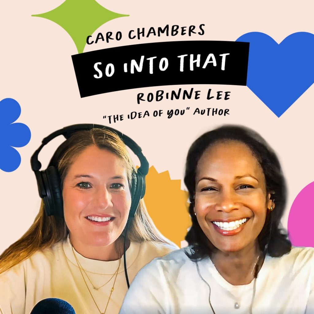 Two women smiling; one wears headphones and speaks into a mic, the other is in front of a colorful graphic that reads, "Caro Chambers So Into That Robinne Lee 'The Idea of You' Author.