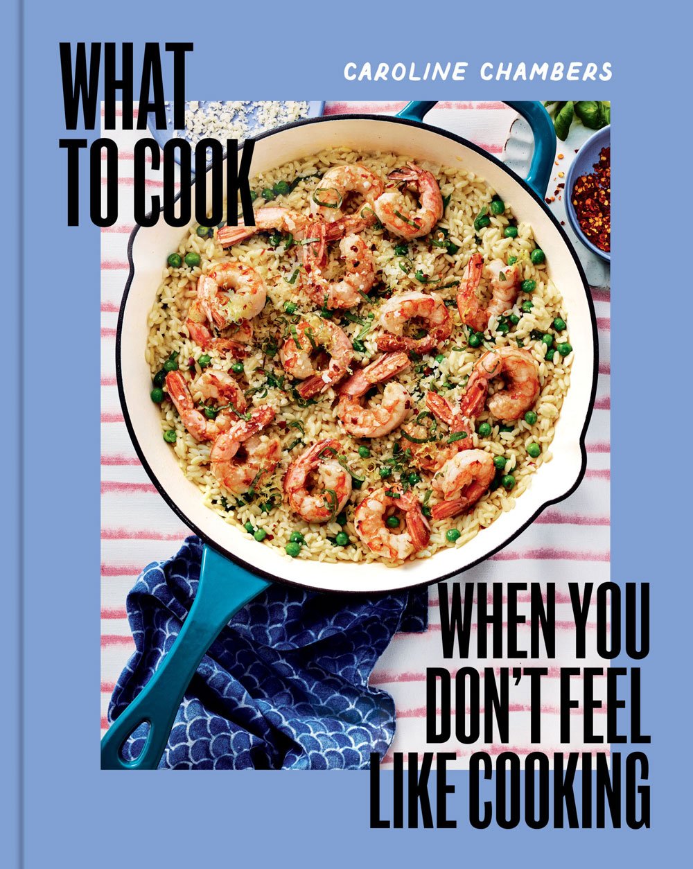A cookbook cover titled "What to Cook When You Don’t Feel Like Cooking" by Caroline Chambers, featuring a skillet of shrimp and rice.
